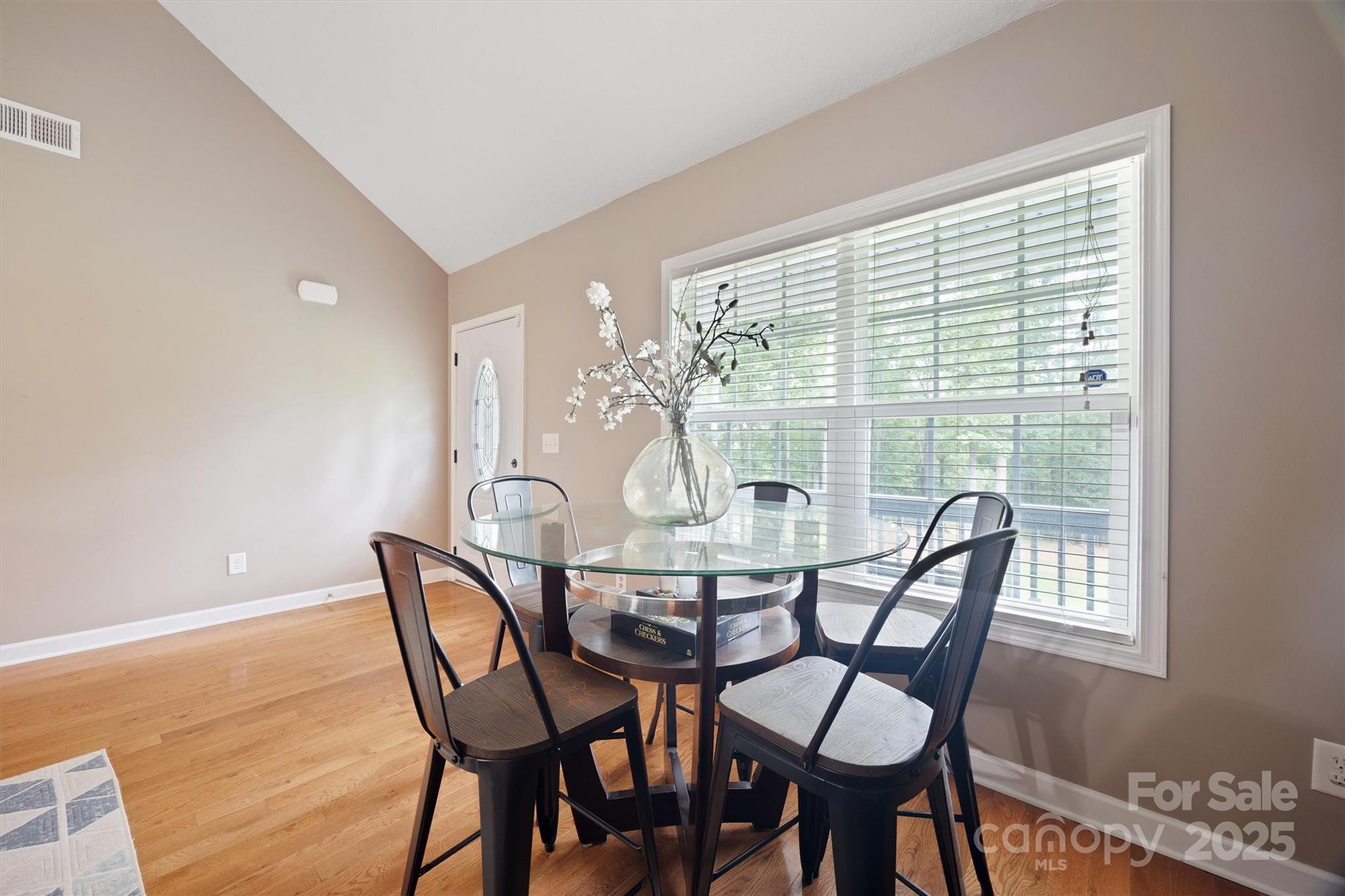 587 Kelly Road York, SC 29745 - Photo 5 of 28 a view of a dining room with furniture and wooden floor