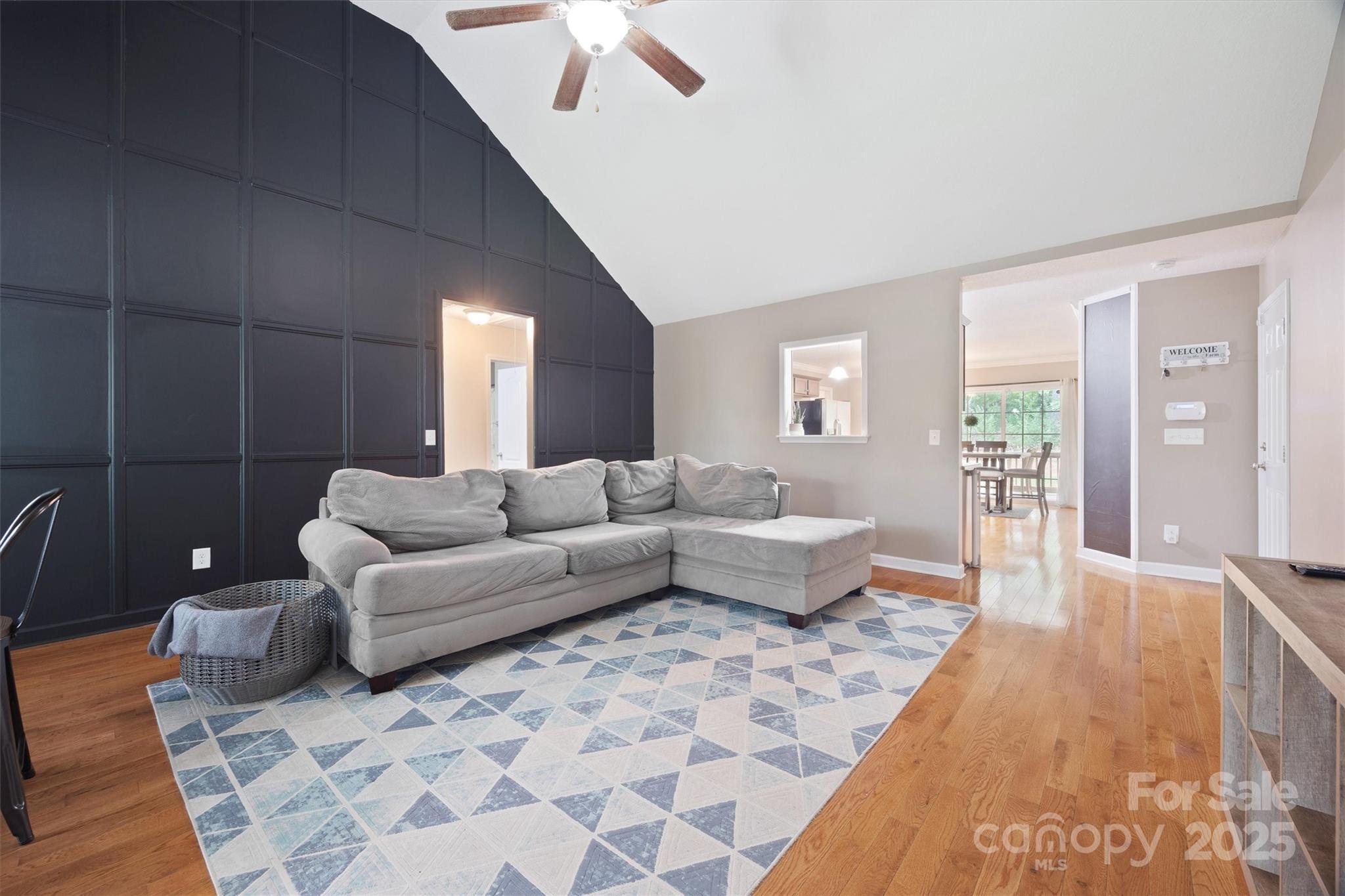 587 Kelly Road York, SC 29745 - Photo 7 of 28 a living room with furniture and wooden floor