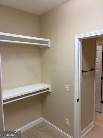 a view of a bathroom from a hallway
