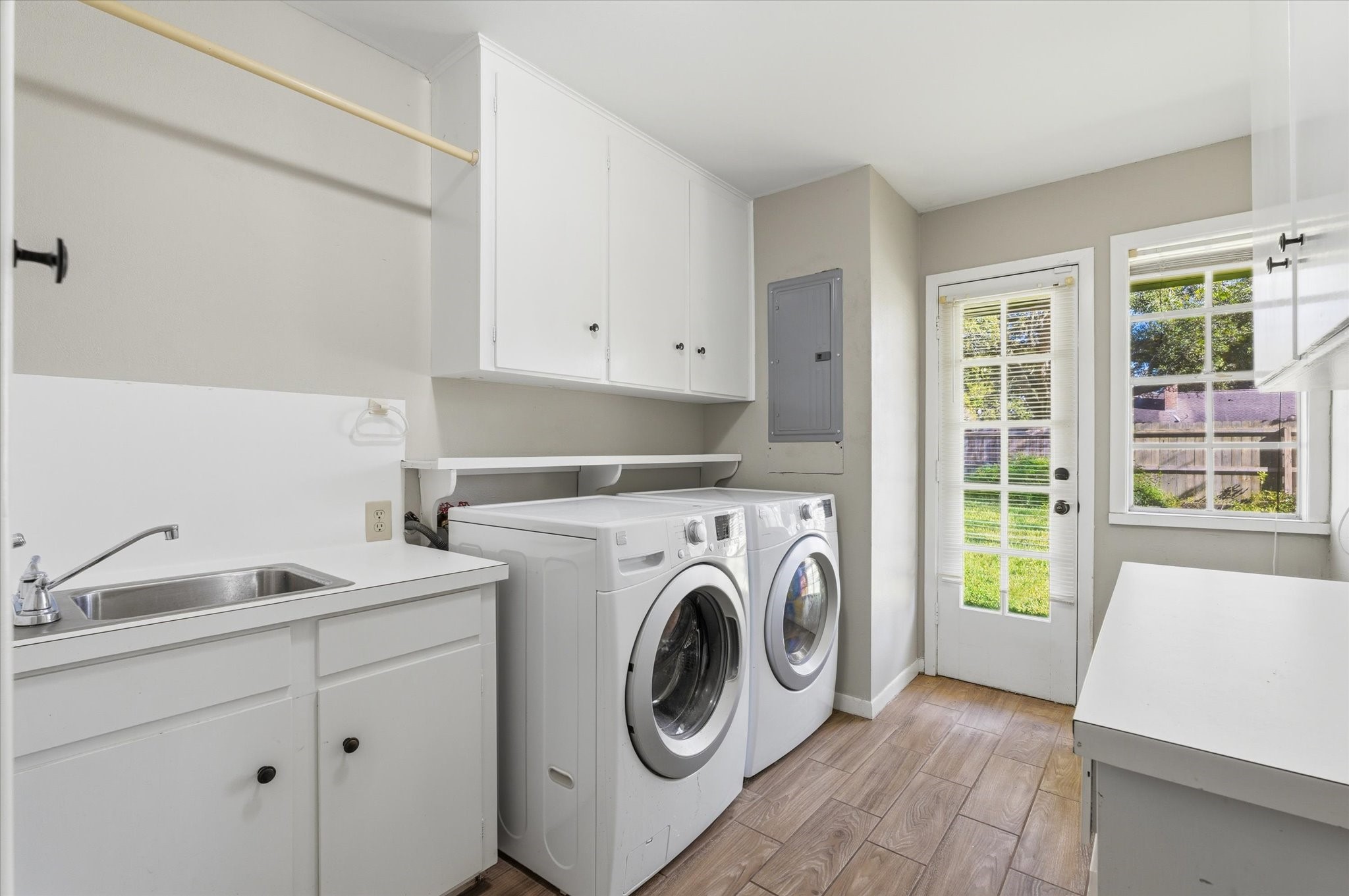 6004 Lakeside Drive Liberty, TX 77575 - Photo 13 of 28 a utility room with sink dryer and washer
