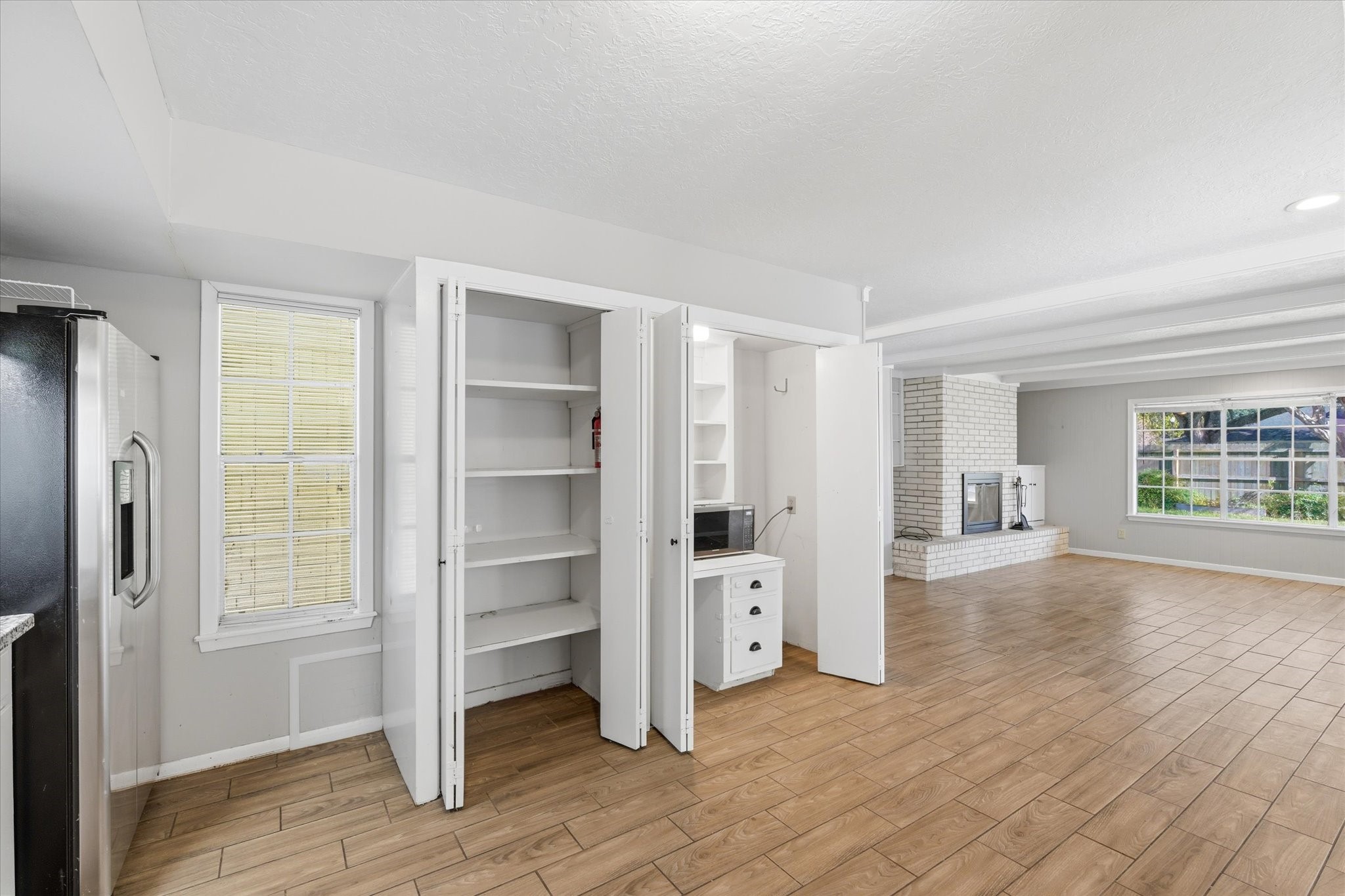 6004 Lakeside Drive Liberty, TX 77575 - Photo 9 of 28 a view of empty room with wooden floor and entryway