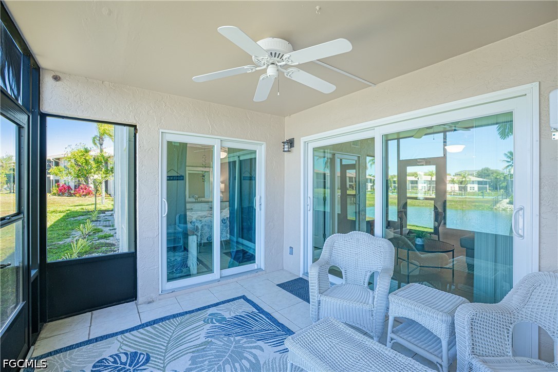 16007 Davis Road, Unit 713 Fort Myers, FL 33908 - Photo 28 of 41 a living room with furniture and a large window