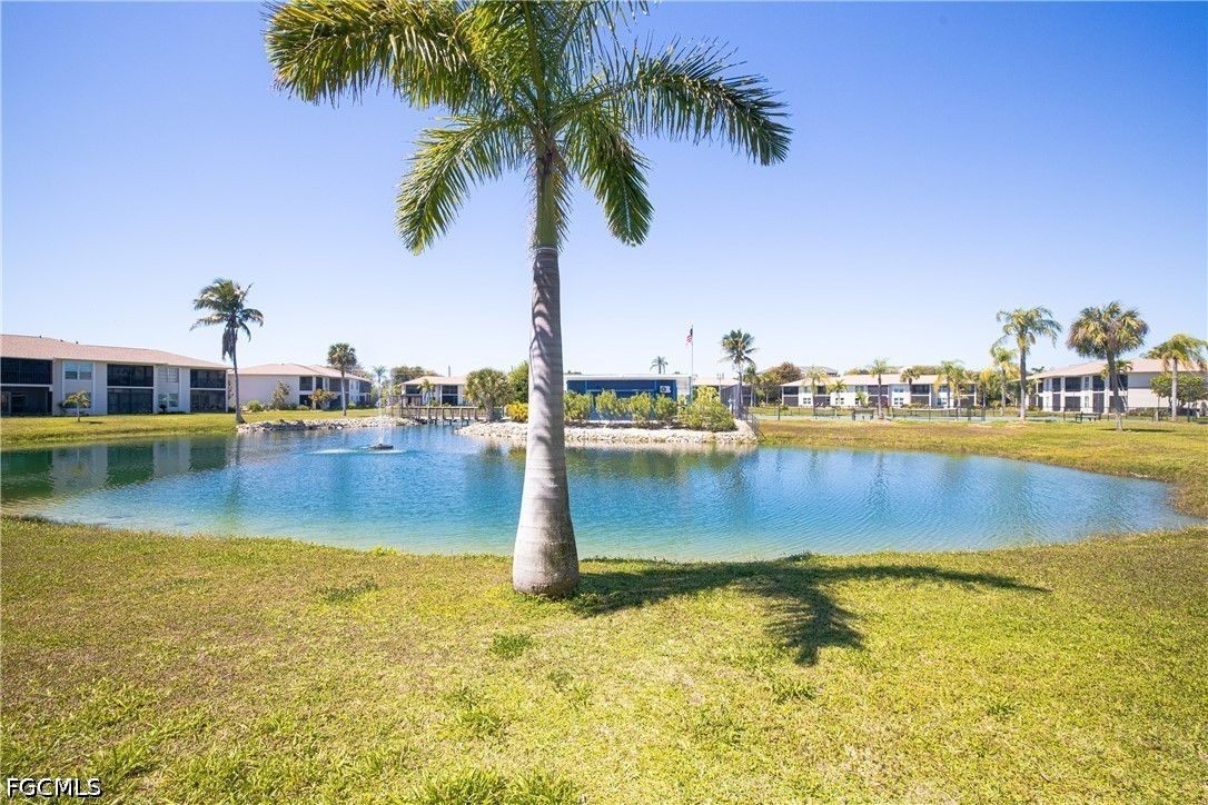 16007 Davis Road, Unit 713 Fort Myers, FL 33908 - Photo 30 of 41 a view of swimming pool with a lake view