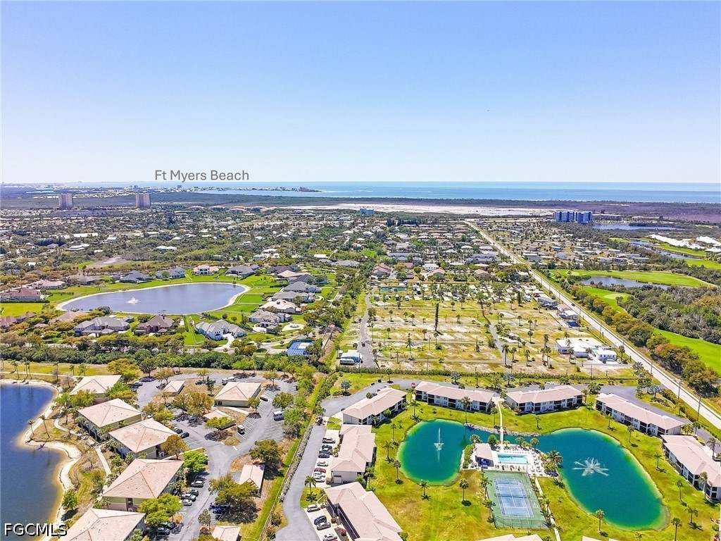 16007 Davis Road, Unit 713 Fort Myers, FL 33908 - Photo 35 of 41 an aerial view of residential houses with outdoor space