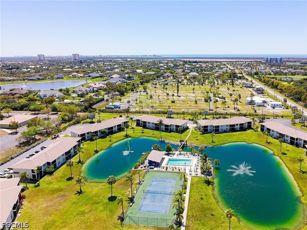 16007 Davis Road, Unit 713 Fort Myers, FL 33908 - Photo 38 of 41 an aerial view of a house with a swimming pool