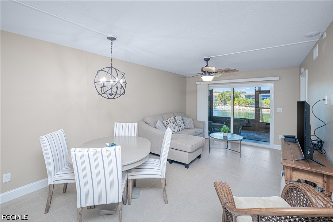 16007 Davis Road, Unit 713 Fort Myers, FL 33908 - Photo 8 of 41 a view of a livingroom with furniture window and outside view