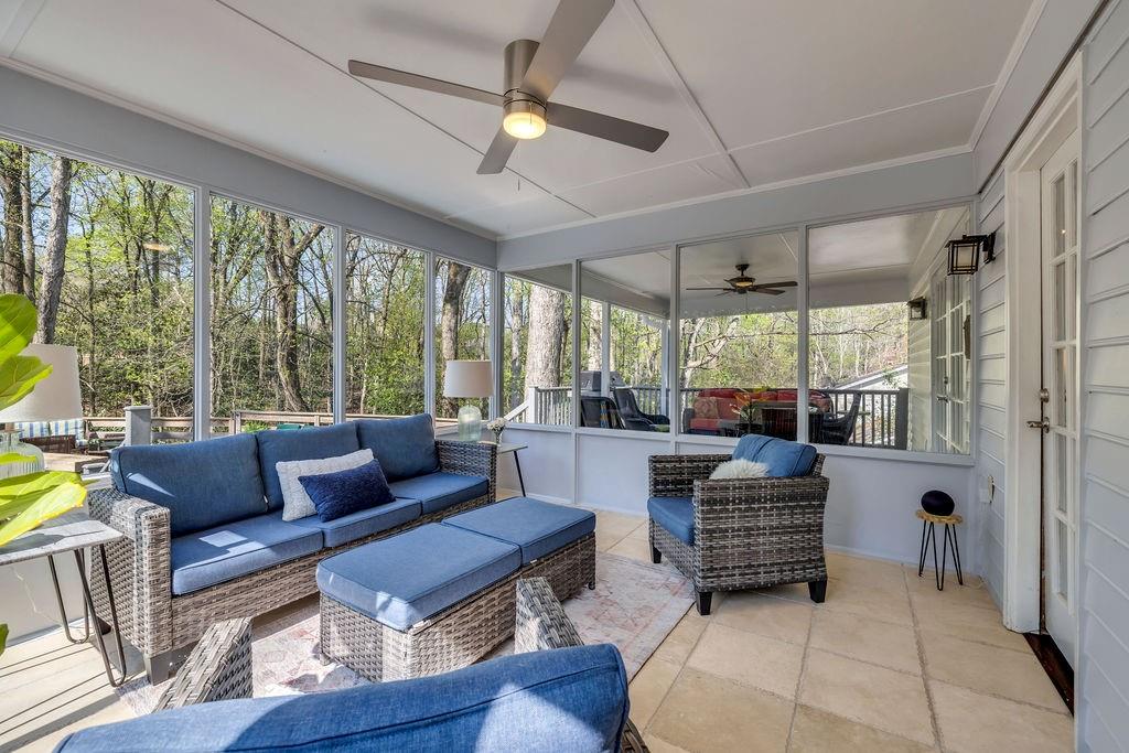 7650 Ryefield Drive Sandy Springs, GA 30350 - Photo 13 of 38 a living room with furniture and a large window