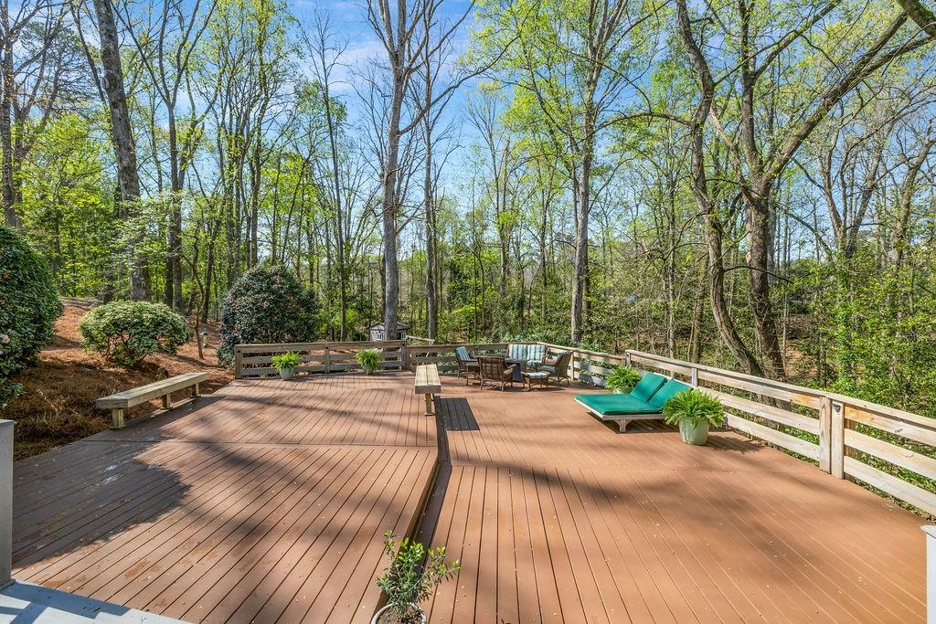 7650 Ryefield Drive Sandy Springs, GA 30350 - Photo 16 of 38 a view of a house with pool and sitting area