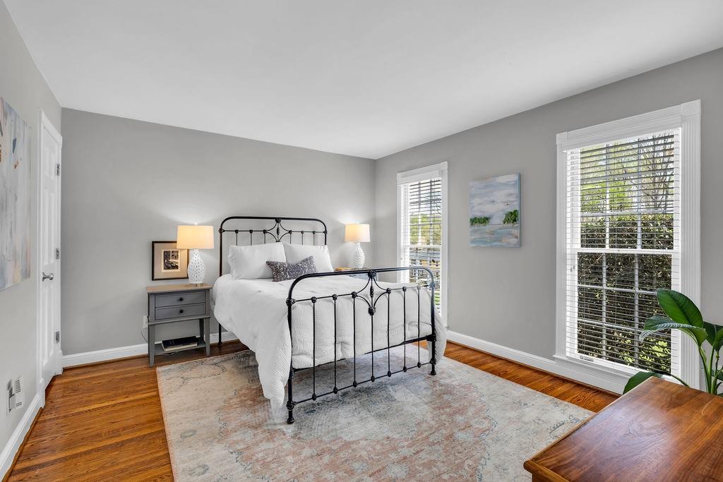 7650 Ryefield Drive Sandy Springs, GA 30350 - Photo 17 of 38 a bedroom with a bed and a window