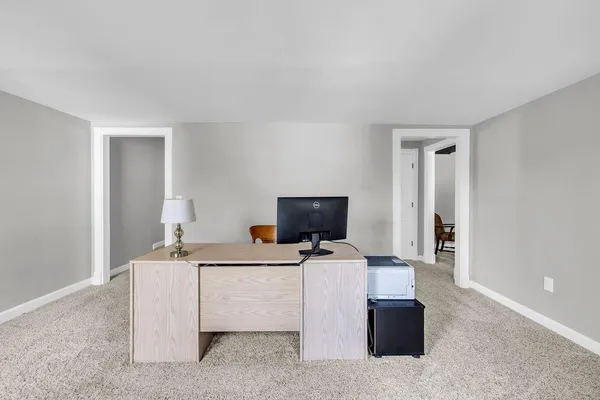 a room with a couch and a flat screen tv