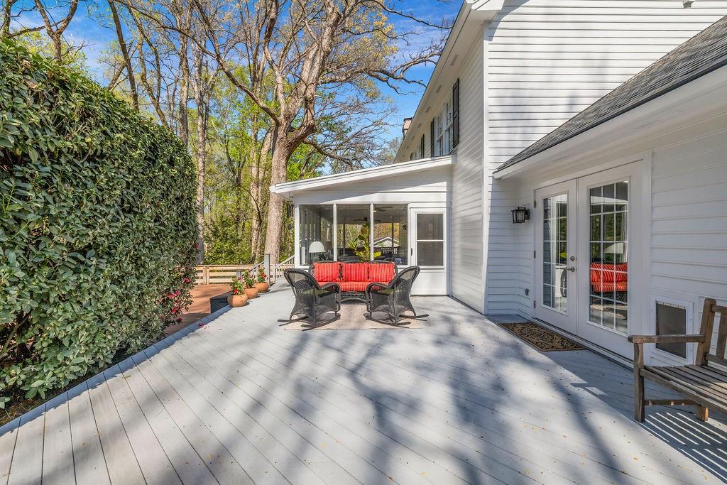 7650 Ryefield Drive Sandy Springs, GA 30350 - Photo 33 of 38 a view of a house with backyard porch and sitting area