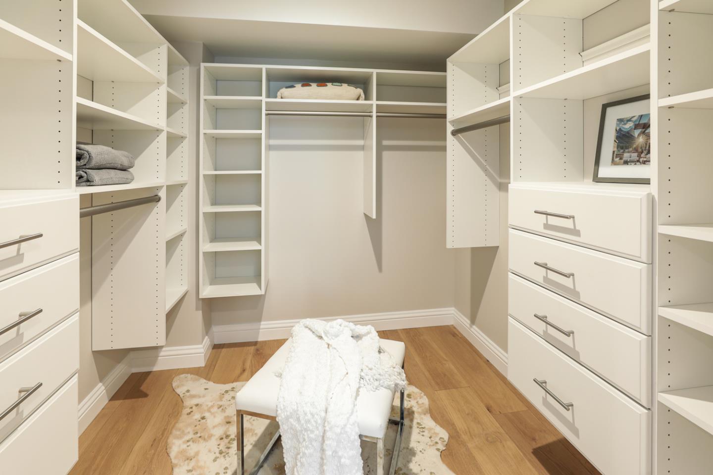 153 Stone Pine Lane Menlo Park, CA 94025 - Photo 15 of 31 a bedroom with a bed and a walk in closet