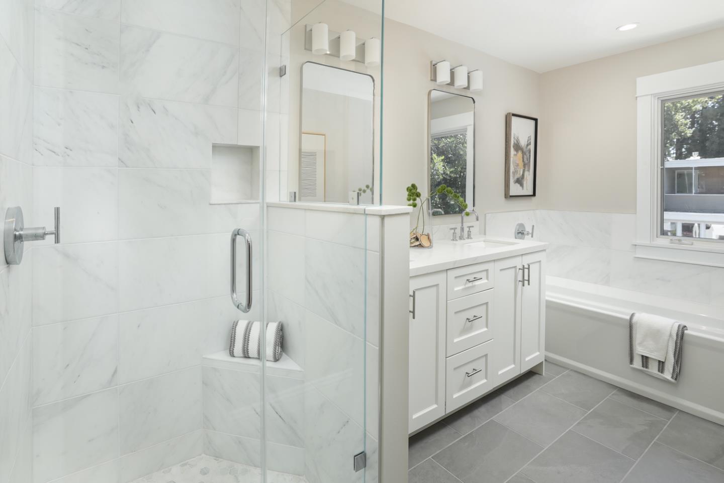 153 Stone Pine Lane Menlo Park, CA 94025 - Photo 16 of 31 a spacious bathroom with a double vanity sink a mirror and a bathtub