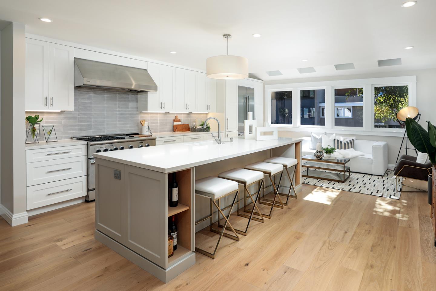 153 Stone Pine Lane Menlo Park, CA 94025 - Photo 6 of 31 a kitchen with a stove a refrigerator and a dining table with wooden floor