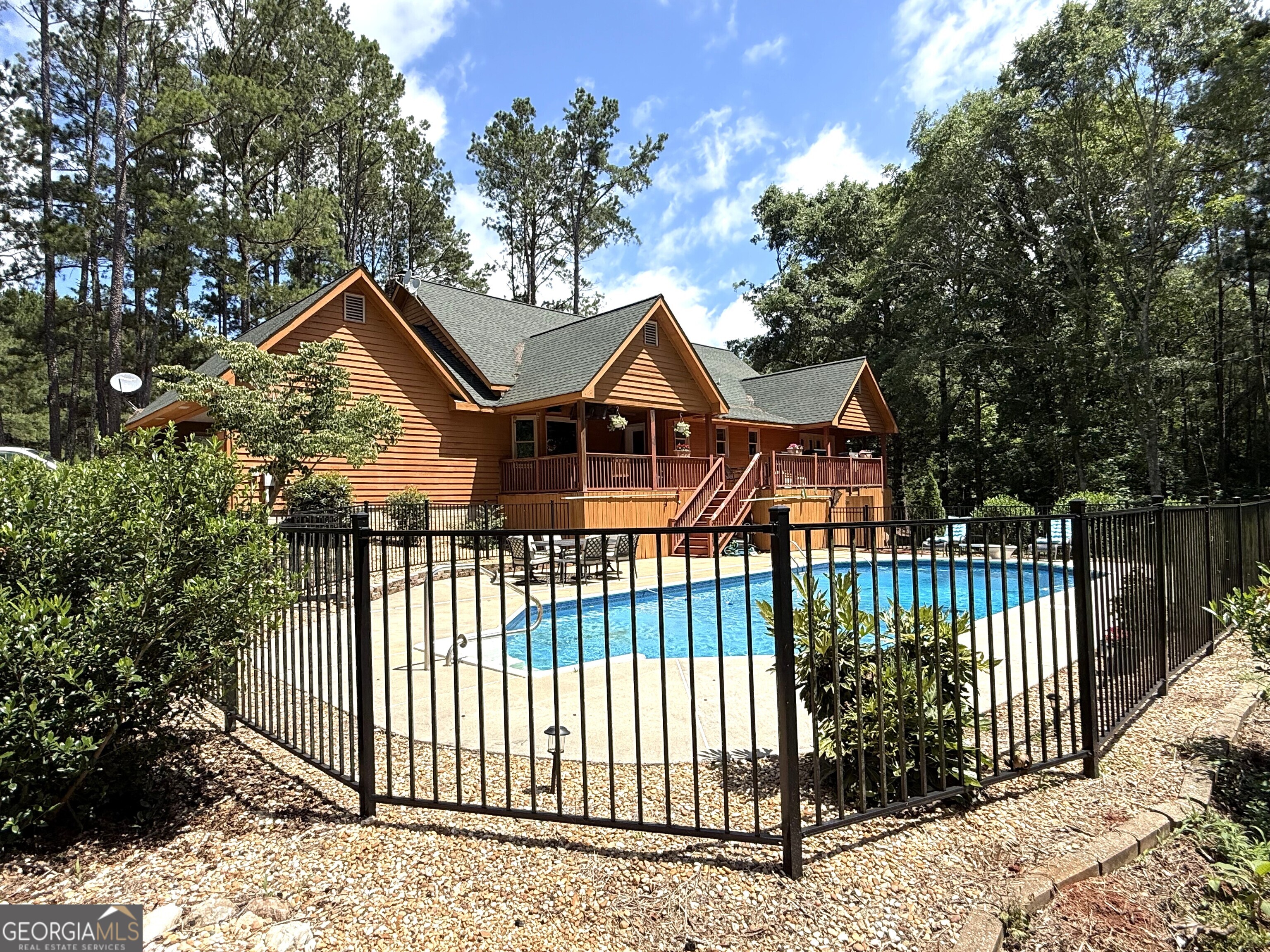 725 Musgrove Road Griffin, GA 30223 - Photo 49 of 52 a front view of a house with a garden