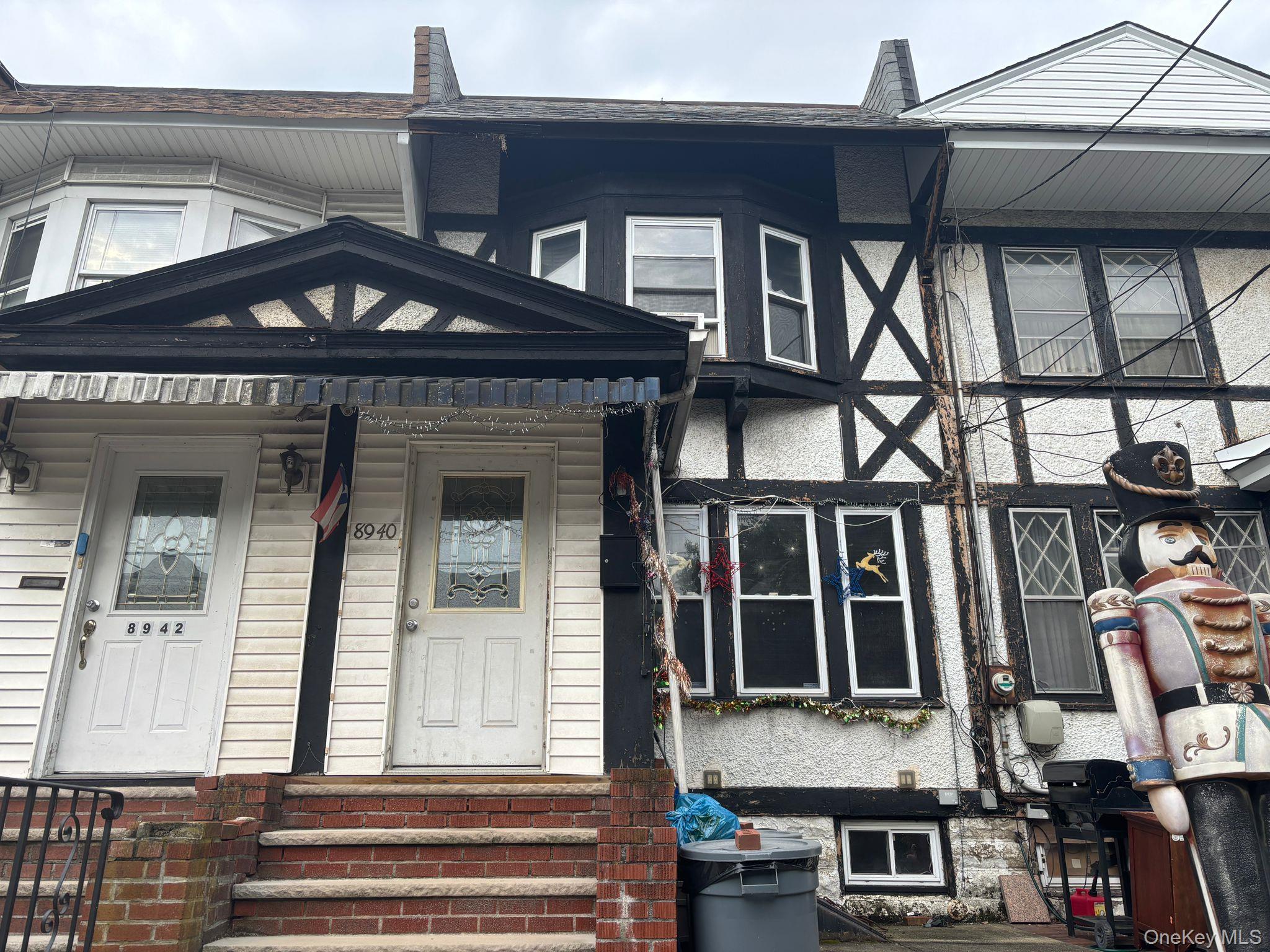 89-40 88th Street Queens, NY 11421 - Photo 2 of 2 a view of a building with a window