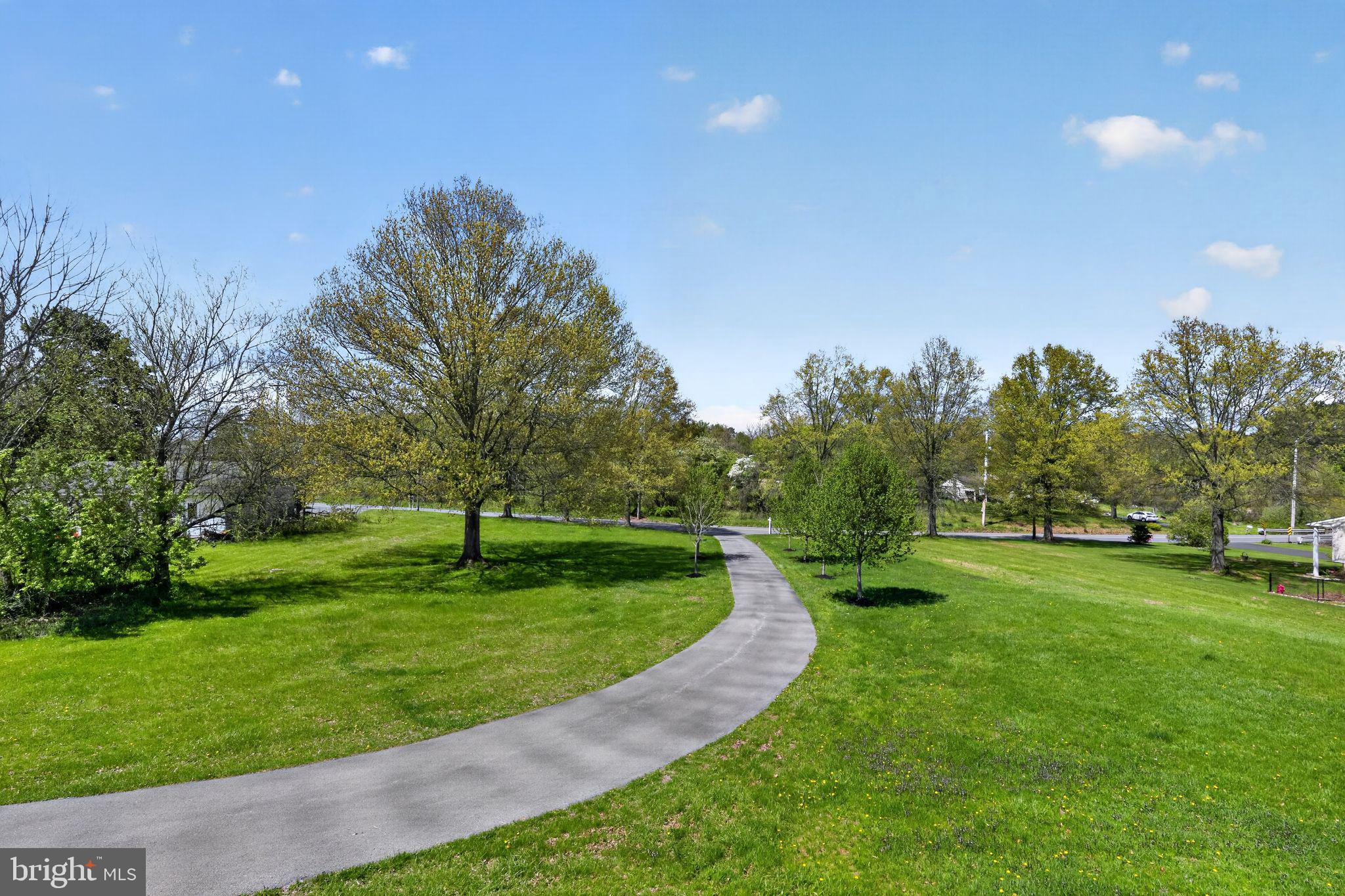 26 Sunset Road Royersford, PA 19468 - Photo 29 of 30 a view of a big yard with a large trees