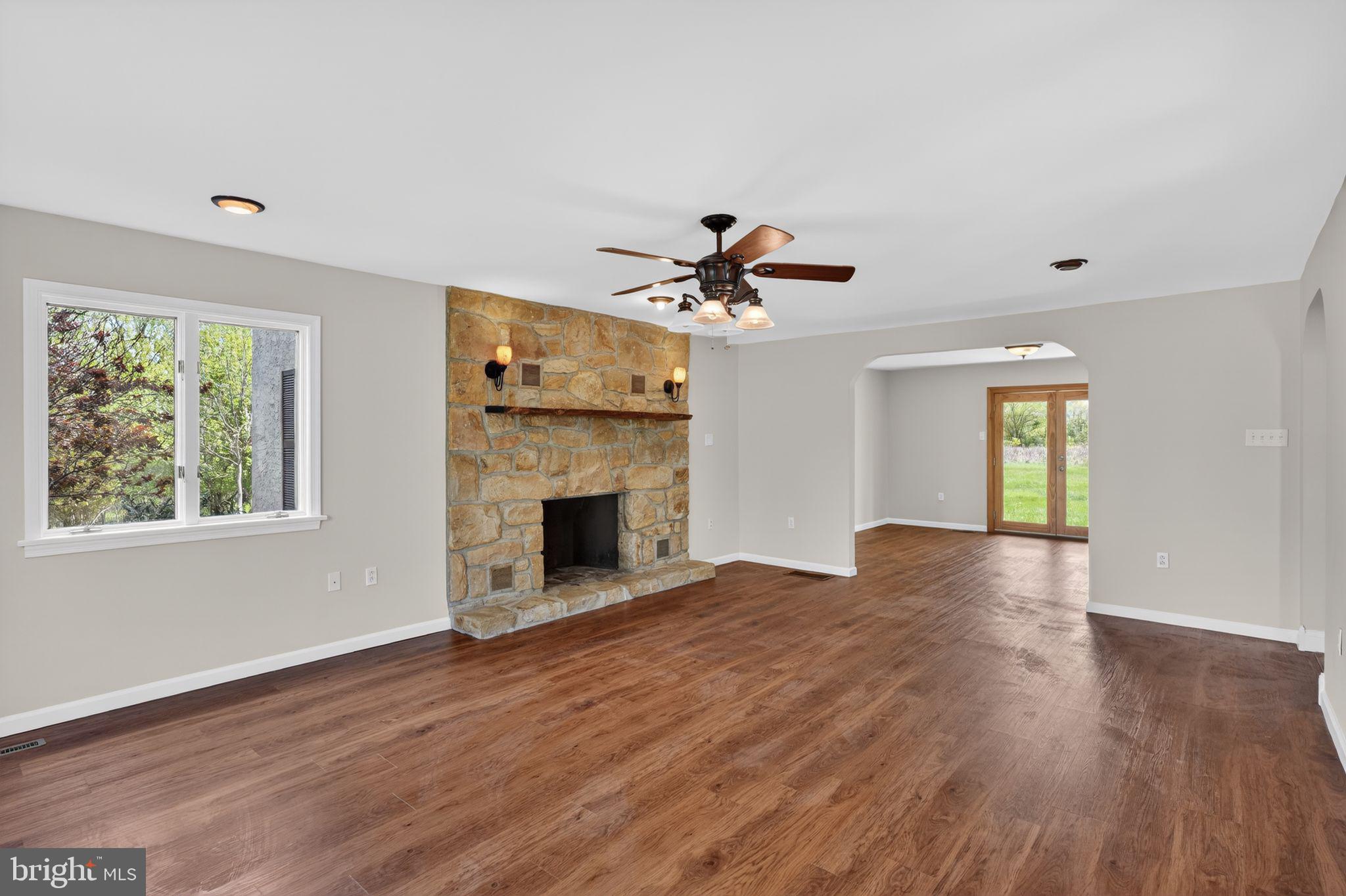 26 Sunset Road Royersford, PA 19468 - Photo 5 of 30 a view of an empty room with a window and fireplace