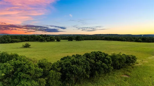 a view of an ocean and mountain