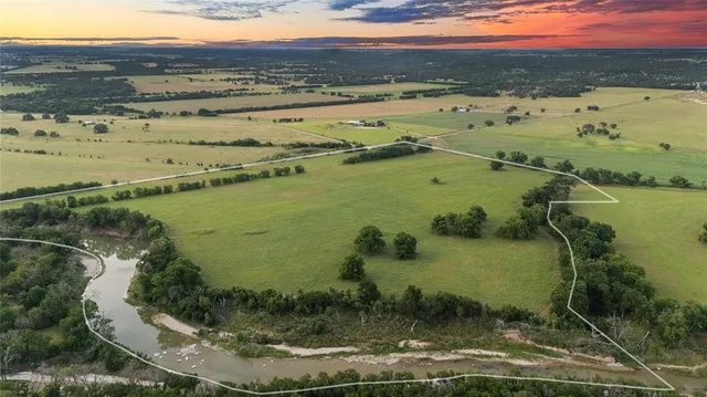 a view of an ocean and mountain