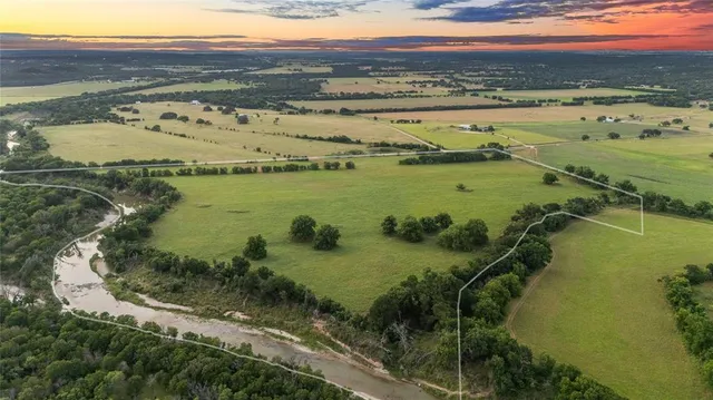 a view of an ocean and mountain