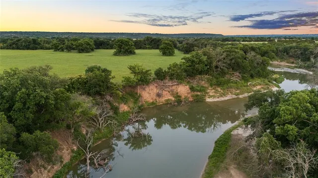 a view of a lake from a yard