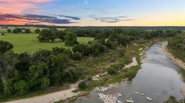 a view of a lake with a mountain in the background