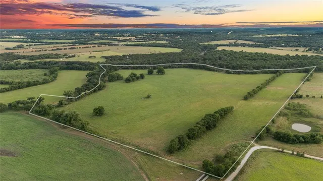 a view of a lake with a outdoor space