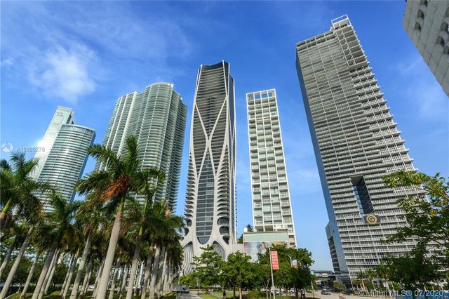 a view of balcony with potted plants