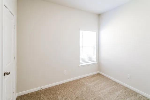 an empty room with a window