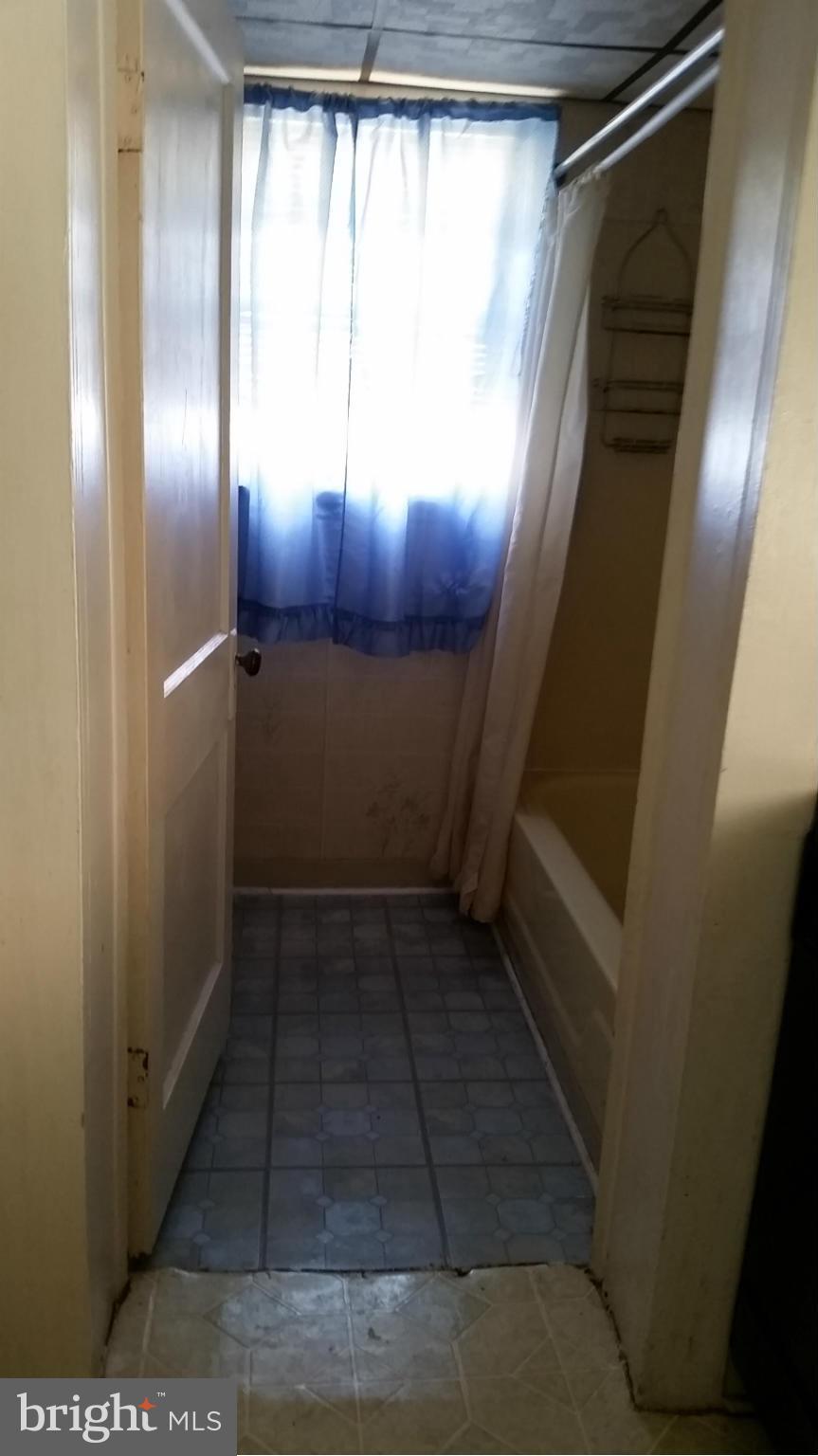 6501 Baltimore Avenue Baltimore, MD 21222 - Photo 13 of 21 a view of entryway with wooden floor