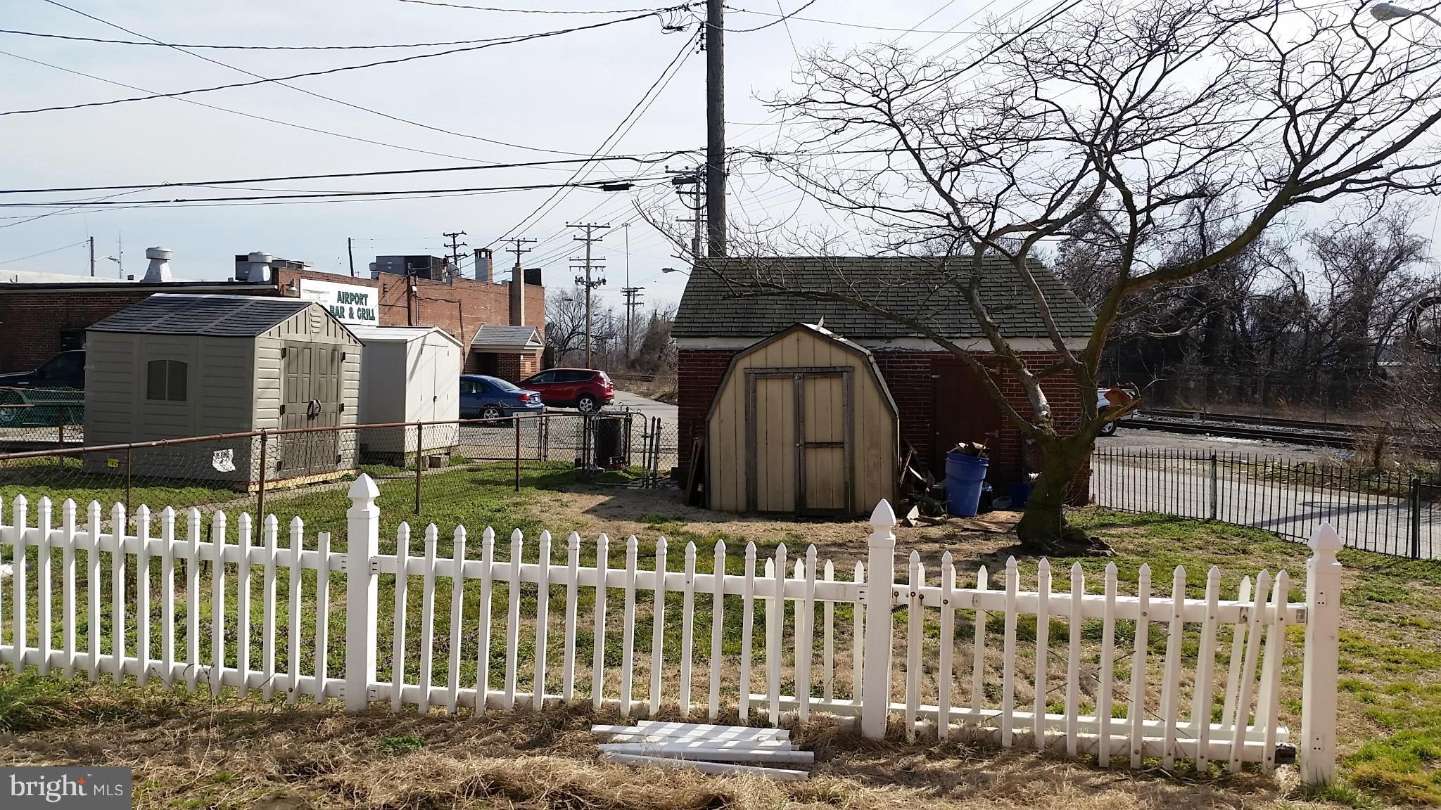 6501 Baltimore Avenue Baltimore, MD 21222 - Photo 20 of 21 a view of a house with wooden fence