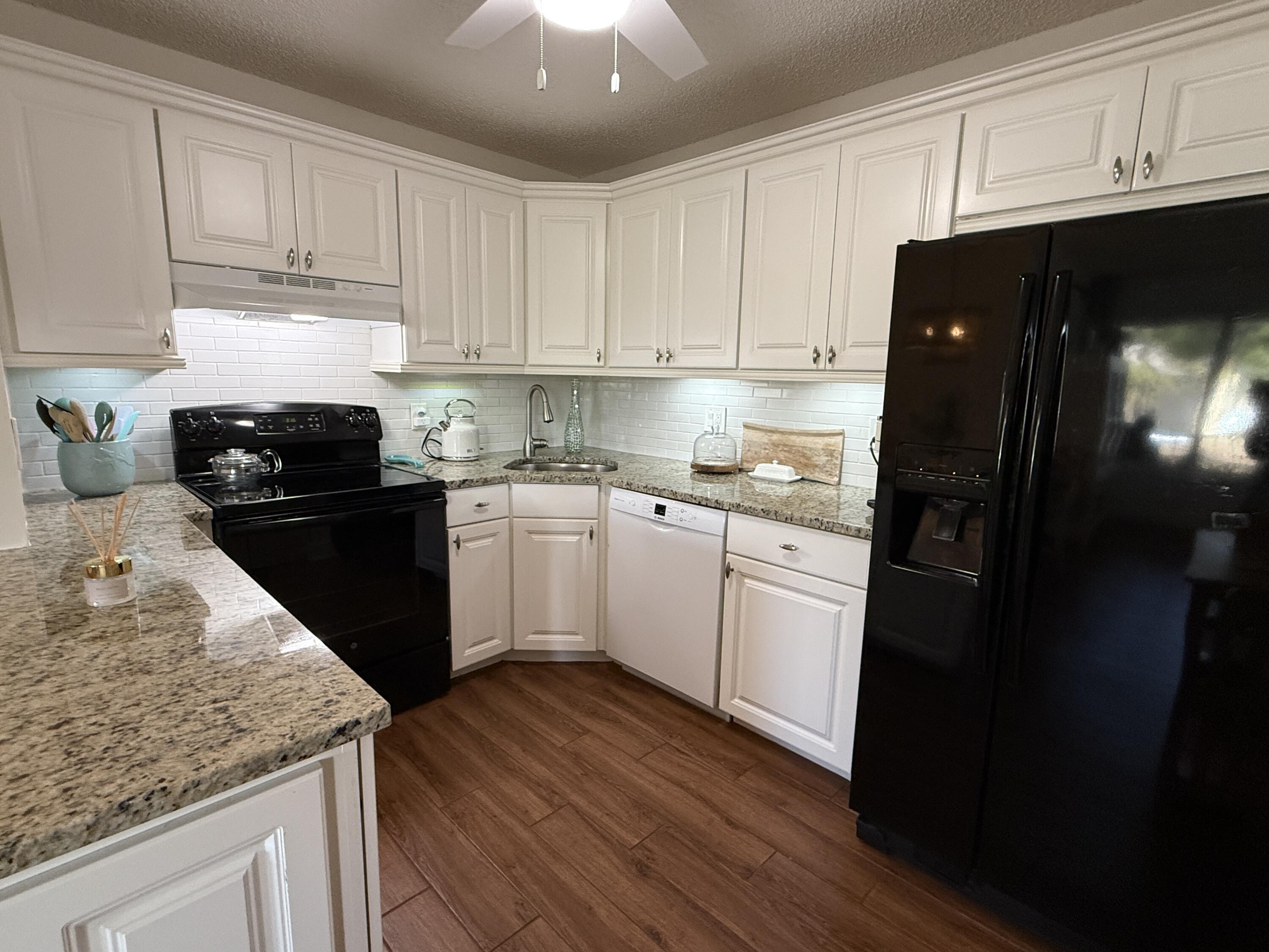 338 Pine Ridge Circle, Unit B2 Greenacres, FL 33463 - Photo 20 of 55 Kitchen