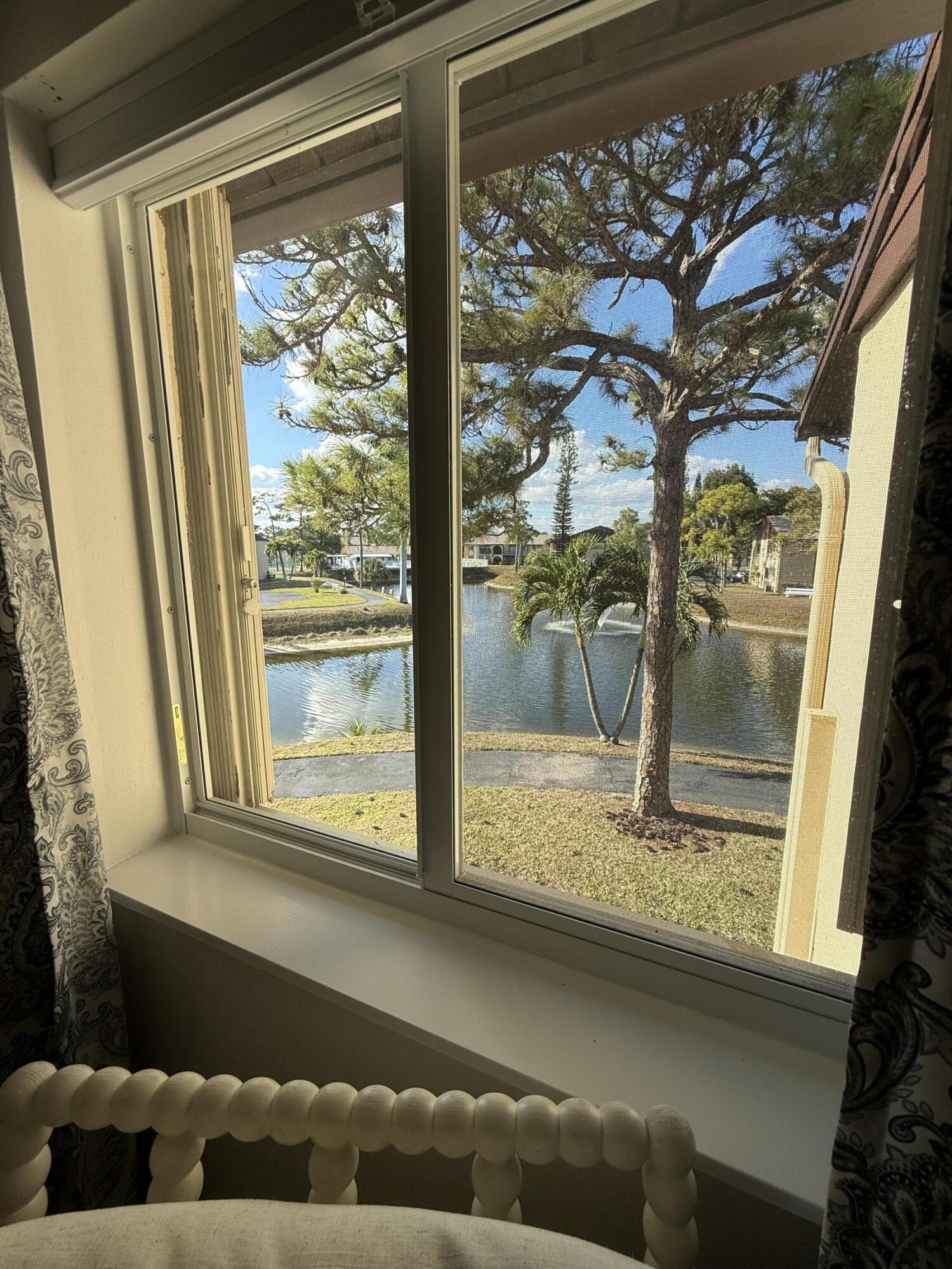 338 Pine Ridge Circle, Unit B2 Greenacres, FL 33463 - Photo 25 of 55 Living Room View