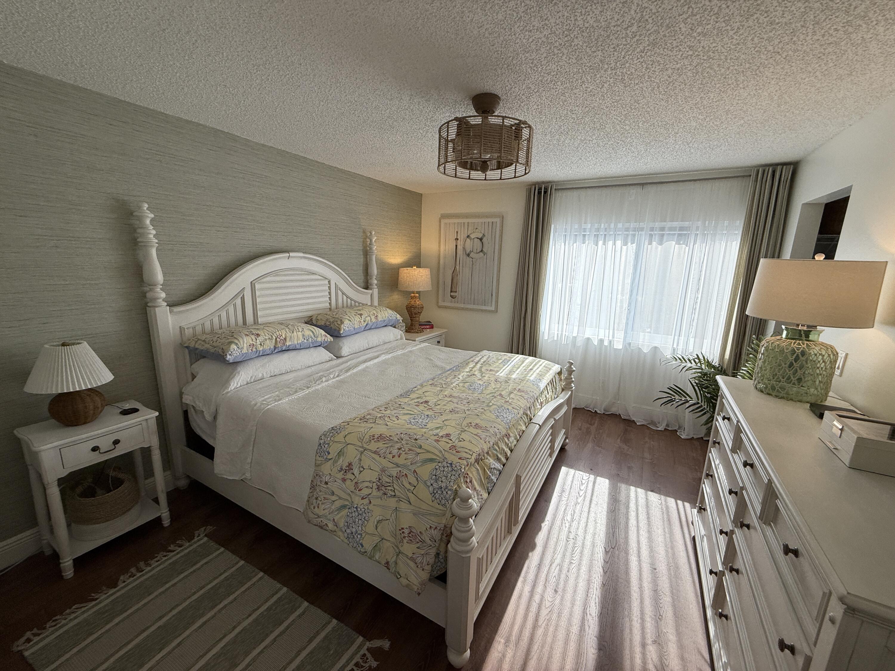 338 Pine Ridge Circle, Unit B2 Greenacres, FL 33463 - Photo 27 of 55 Master Bedroom