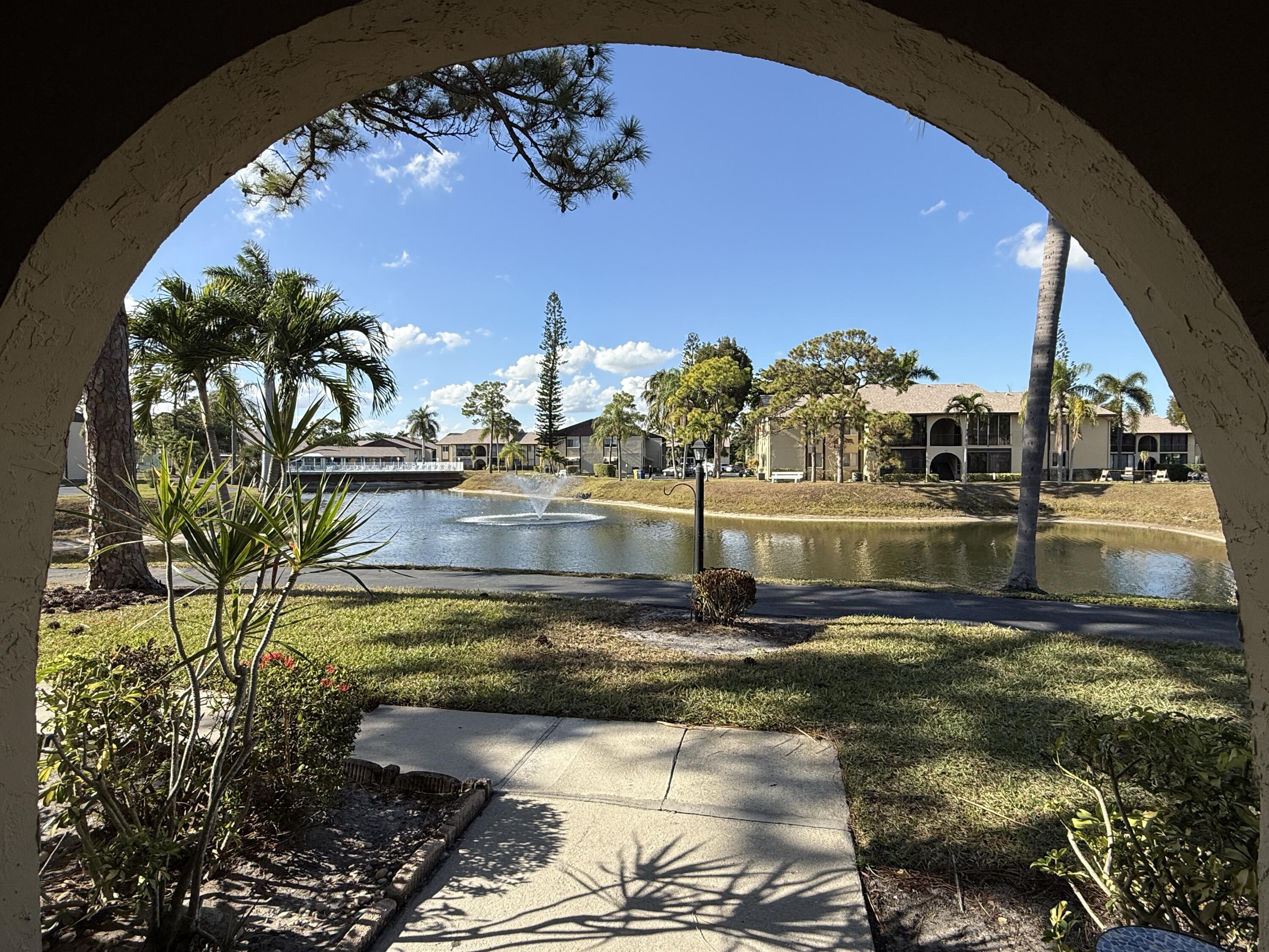 338 Pine Ridge Circle, Unit B2 Greenacres, FL 33463 - Photo 5 of 55 View from Building Entry Hall