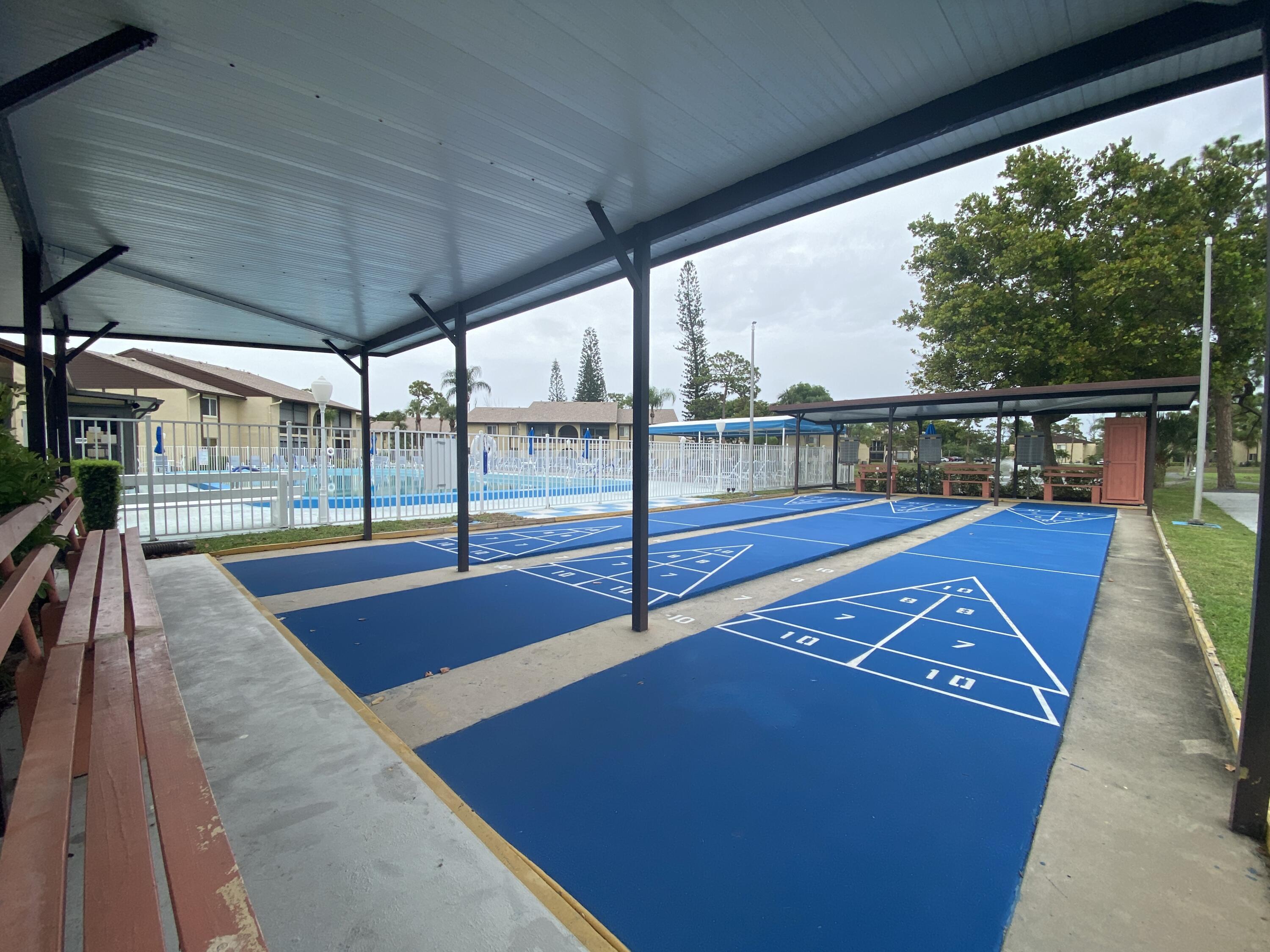 338 Pine Ridge Circle, Unit B2 Greenacres, FL 33463 - Photo 52 of 55 Community Shuffleboard Court