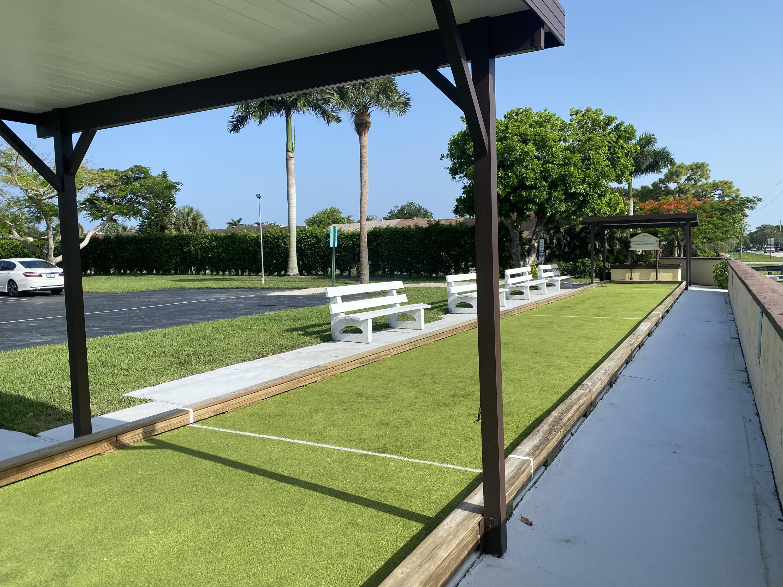 338 Pine Ridge Circle, Unit B2 Greenacres, FL 33463 - Photo 53 of 55 Community Bocce Court