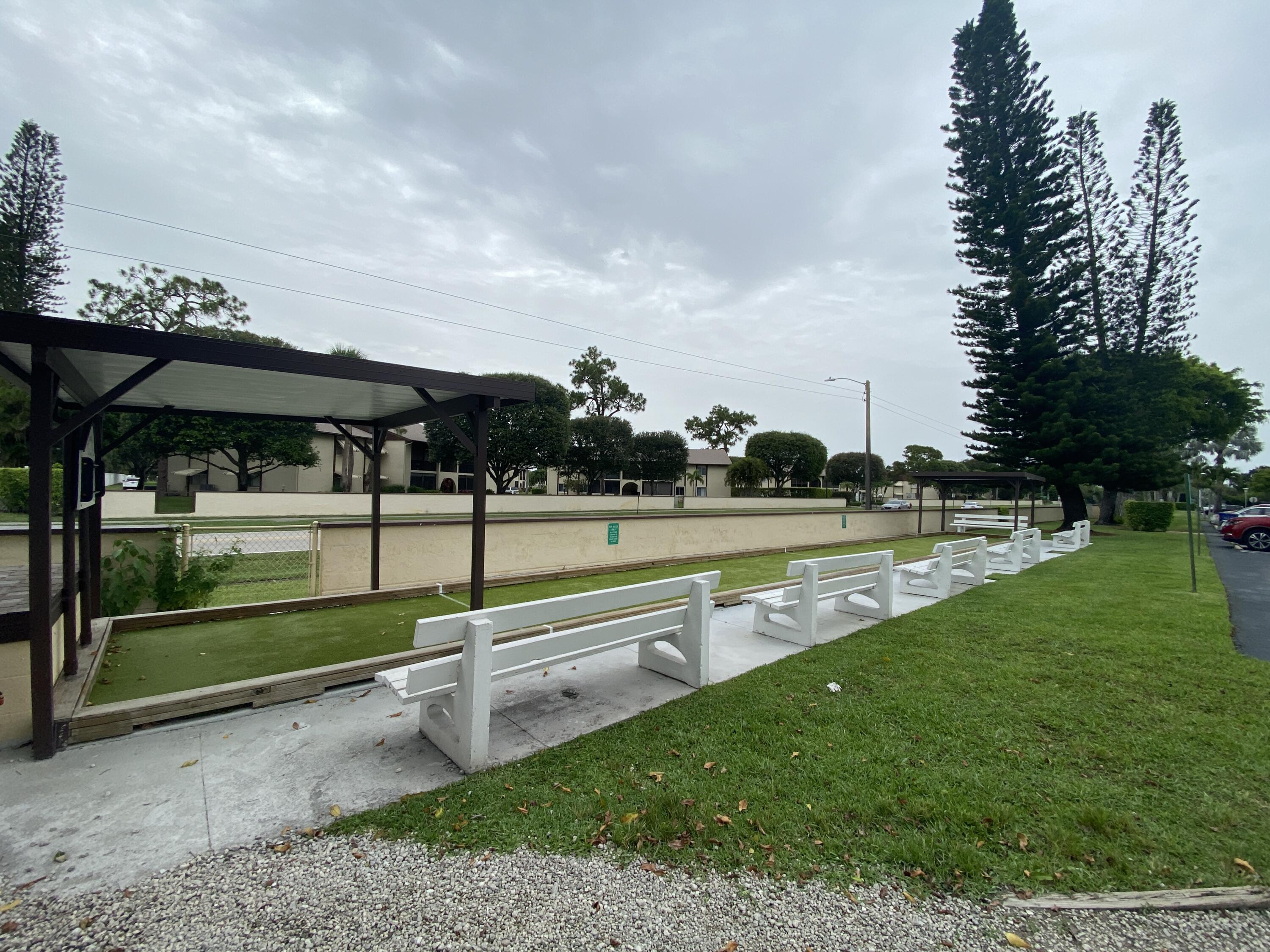 338 Pine Ridge Circle, Unit B2 Greenacres, FL 33463 - Photo 54 of 55 Community Bocce Court