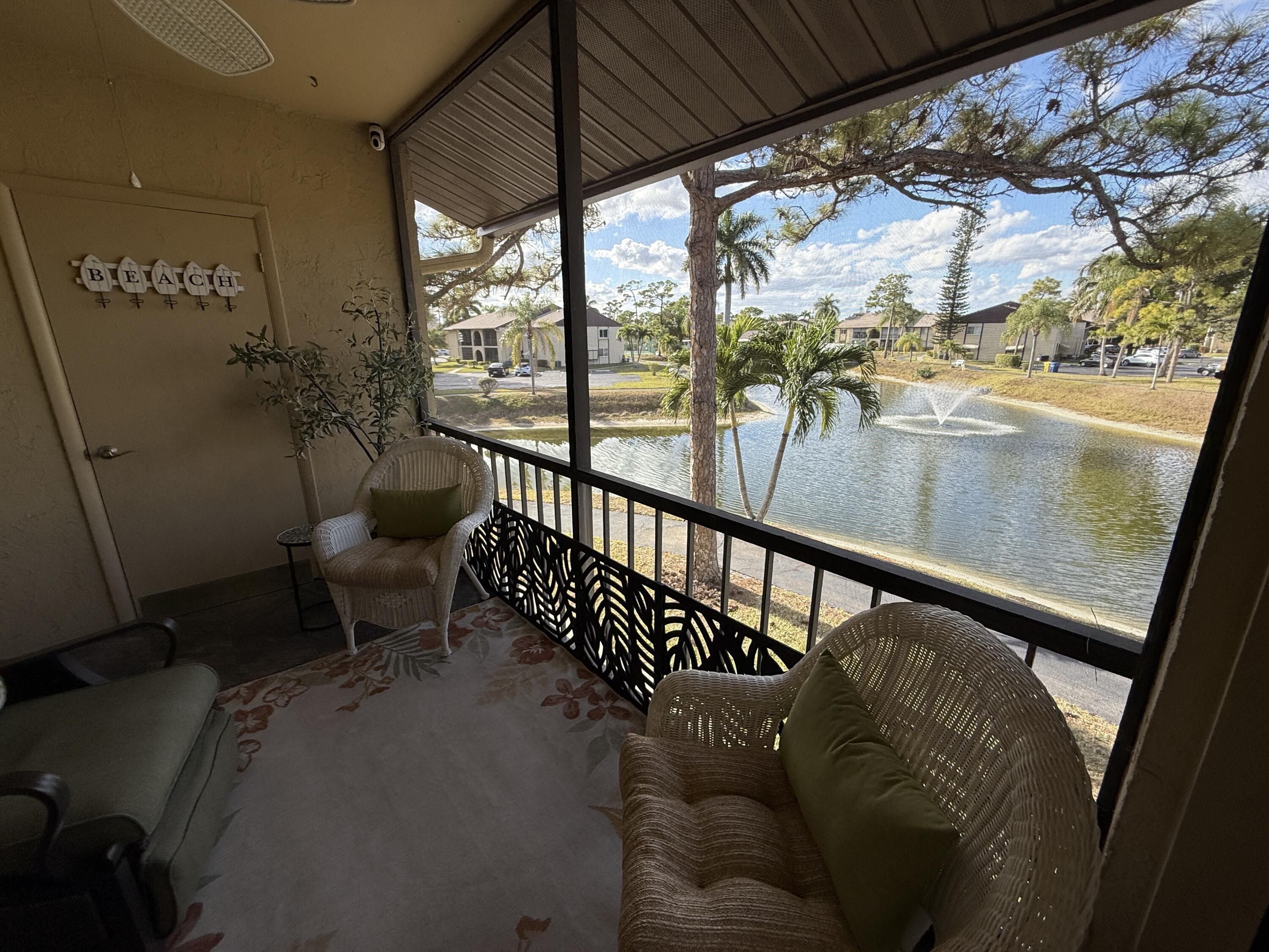 338 Pine Ridge Circle, Unit B2 Greenacres, FL 33463 - Photo 8 of 55 Front Entry & Patio