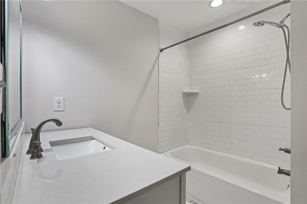 4938 White Boulevard Southwest Mableton, GA 30126 - Photo 23 of 39 a bathroom with a sink and shower