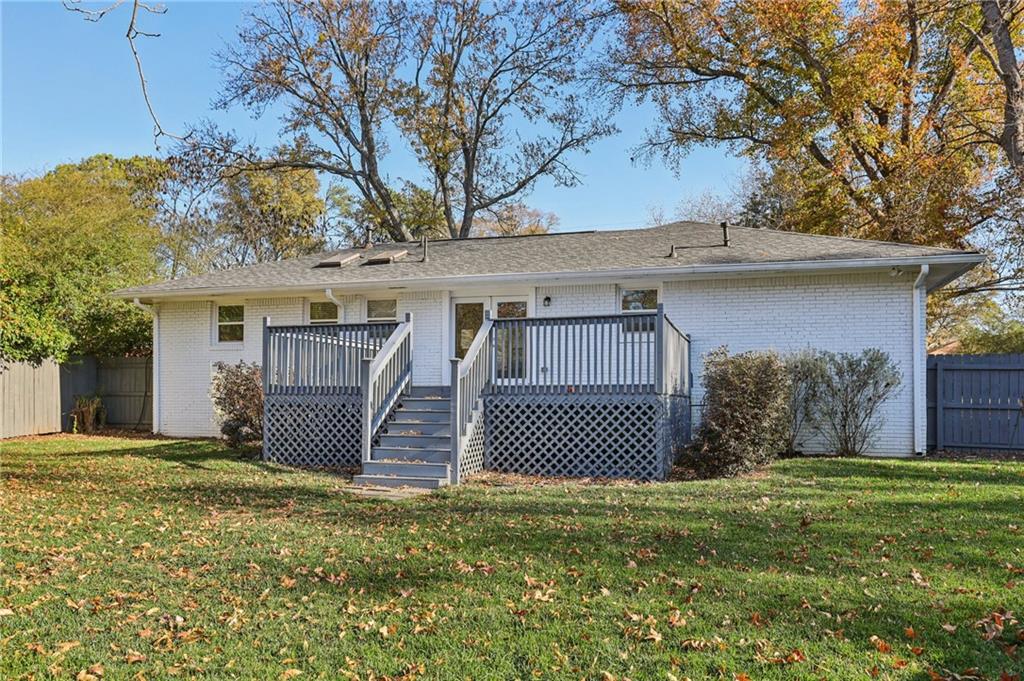 4938 White Boulevard Southwest Mableton, GA 30126 - Photo 35 of 39 a front view of a house with a garden