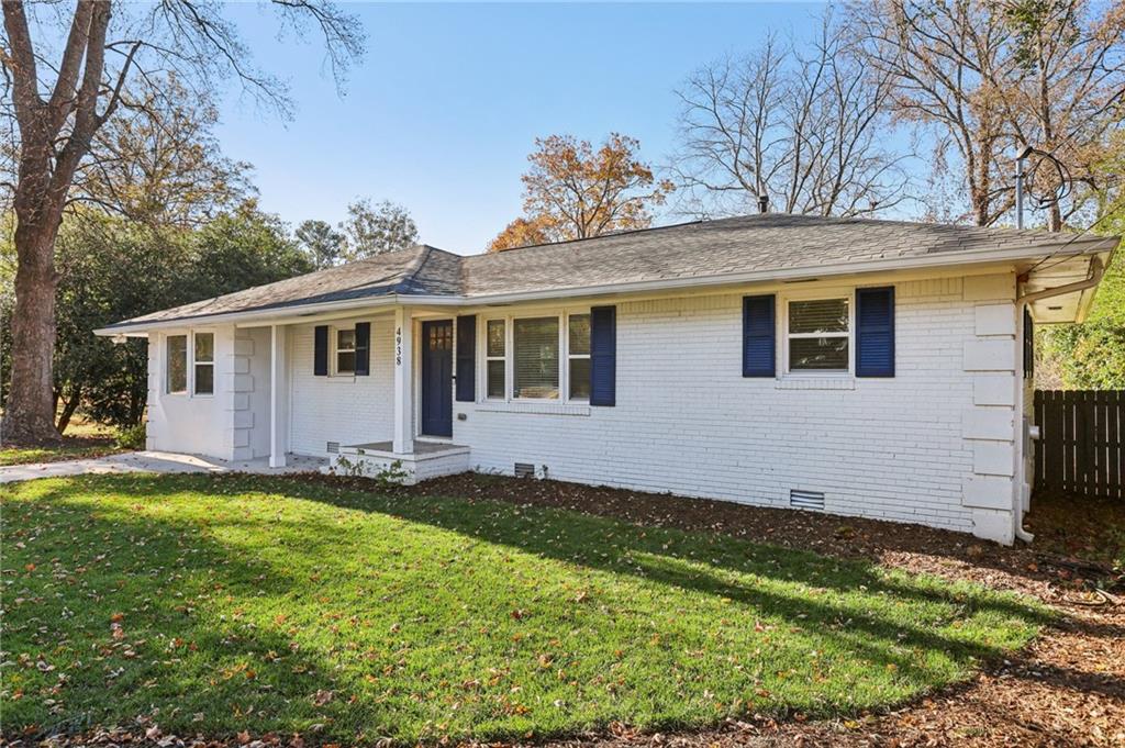 4938 White Boulevard Southwest Mableton, GA 30126 - Photo 37 of 39 a view of a house with a yard