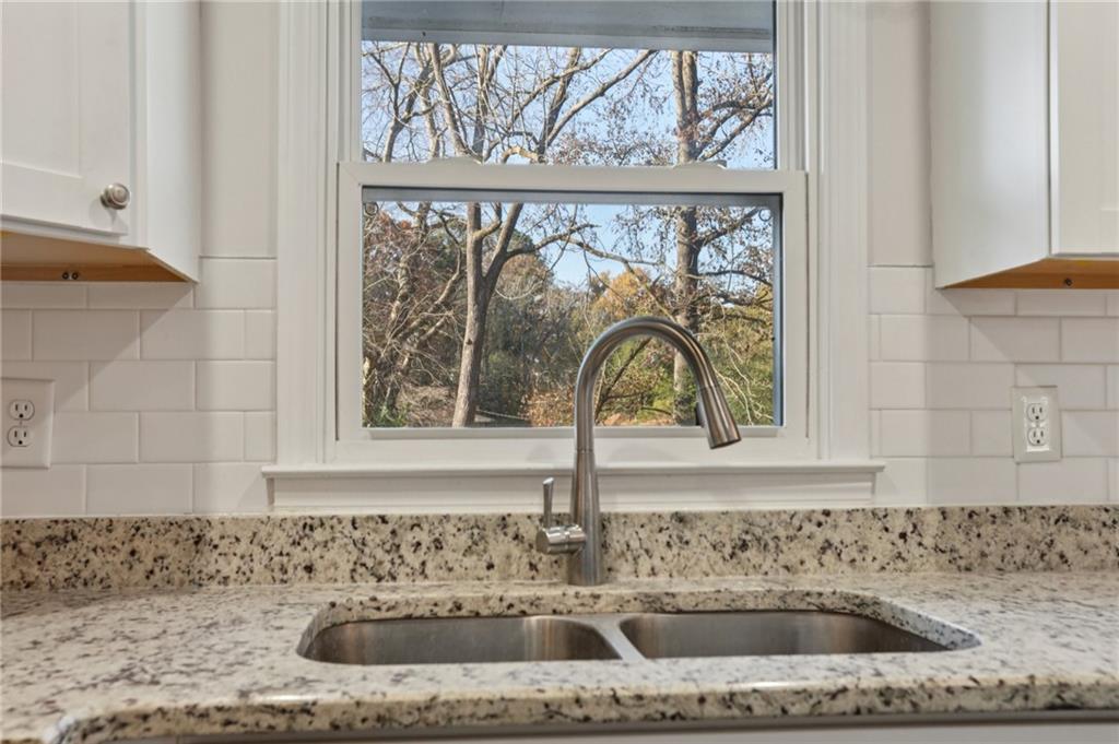4938 White Boulevard Southwest Mableton, GA 30126 - Photo 6 of 39 a bathroom with a sink and a window