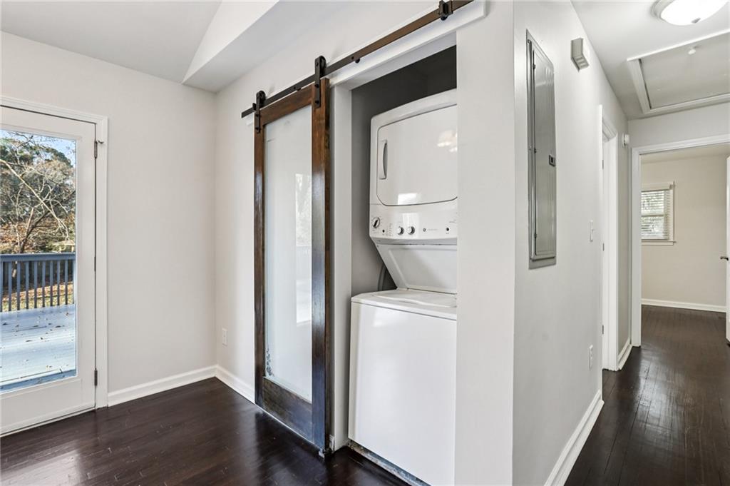4938 White Boulevard Southwest Mableton, GA 30126 - Photo 10 of 39 a view of washer and dryer with wooden floor