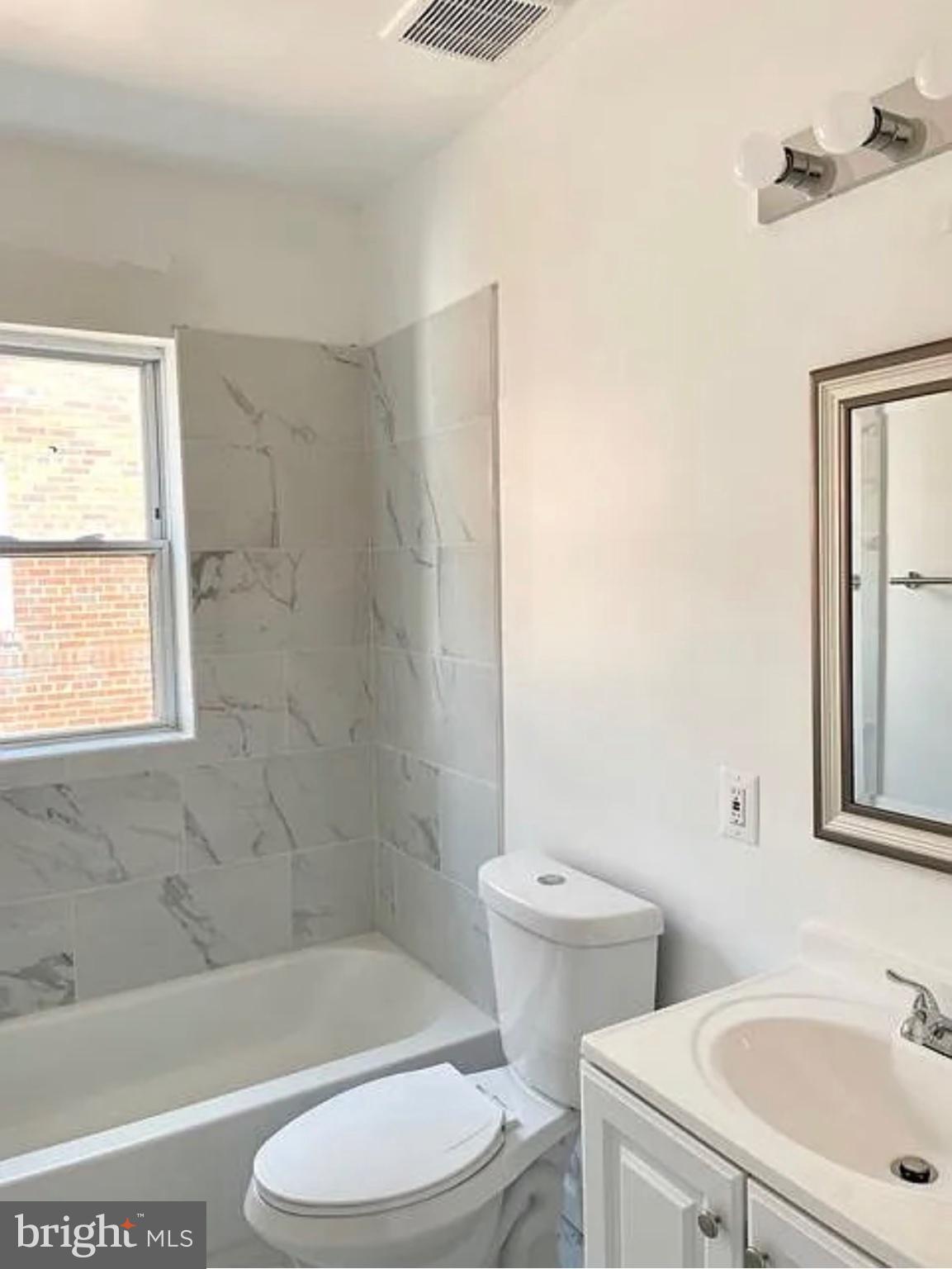 5822 9th Street Northwest, Unit 4 Washington, DC 20011 - Photo 5 of 10 Modern bathroom with elegant finishes.