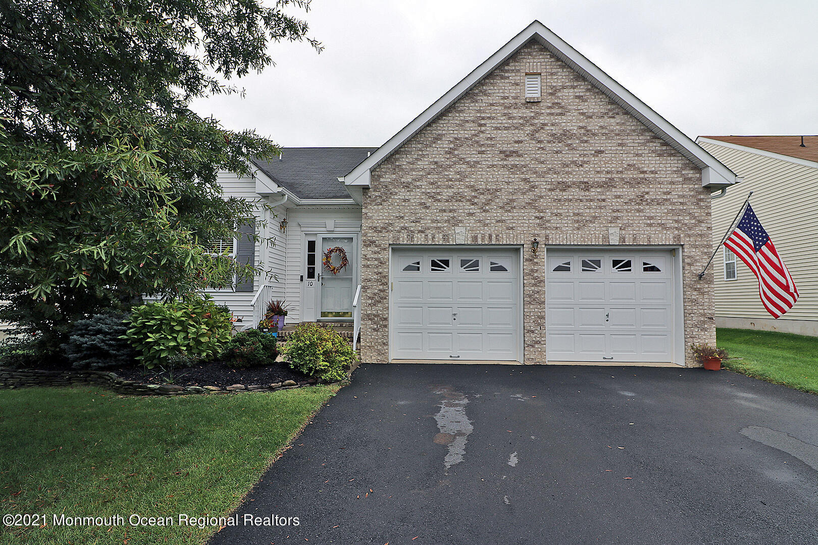 10 Silver Maple Lane Howell, NJ 07731 - Photo 1 of 37 a view of a house with a yard and garage