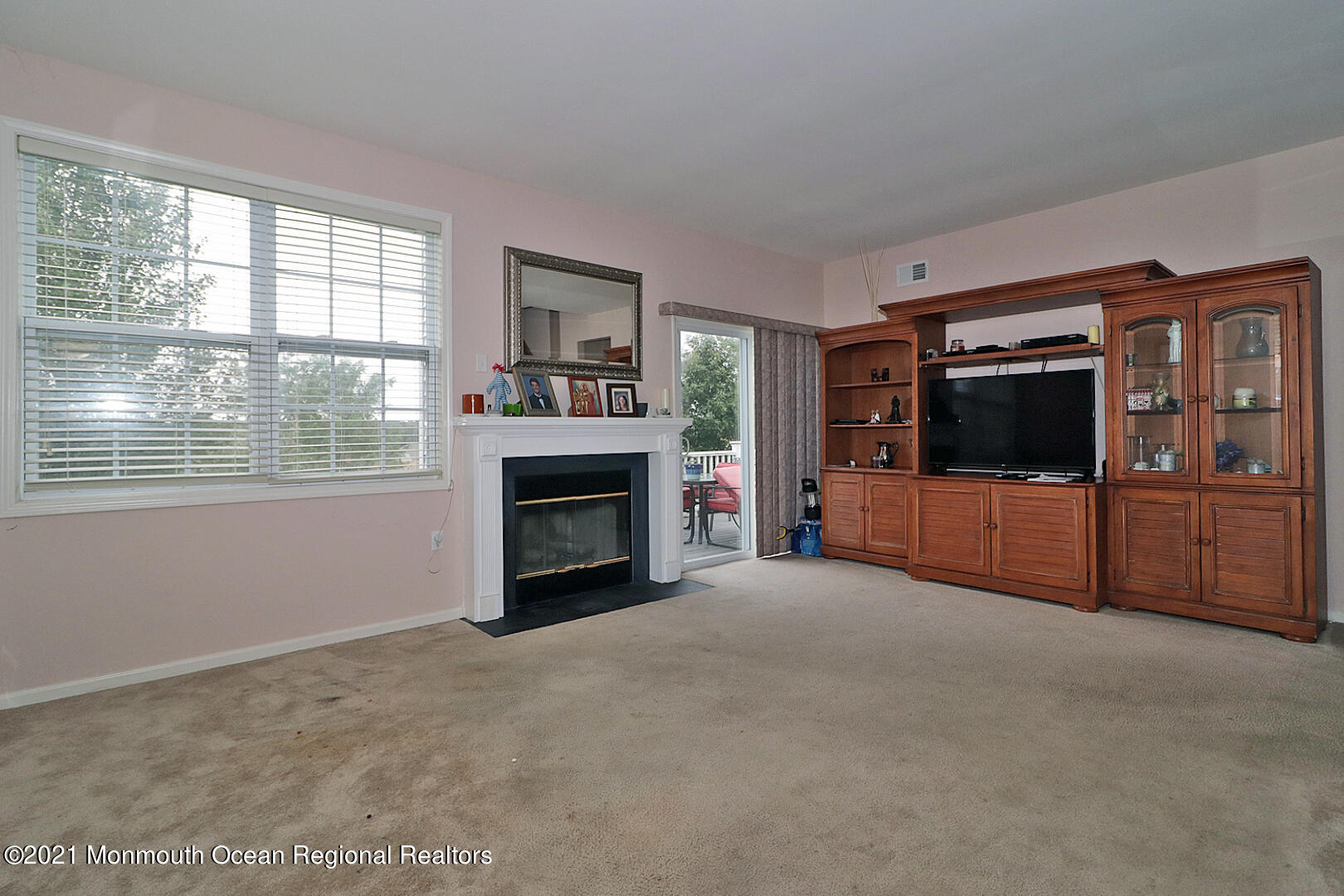 10 Silver Maple Lane Howell, NJ 07731 - Photo 16 of 37 a view of an empty room with a fireplace