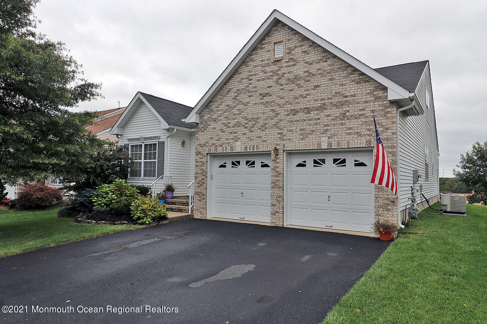 10 Silver Maple Lane Howell, NJ 07731 - Photo 3 of 37 front view of a house with a yard