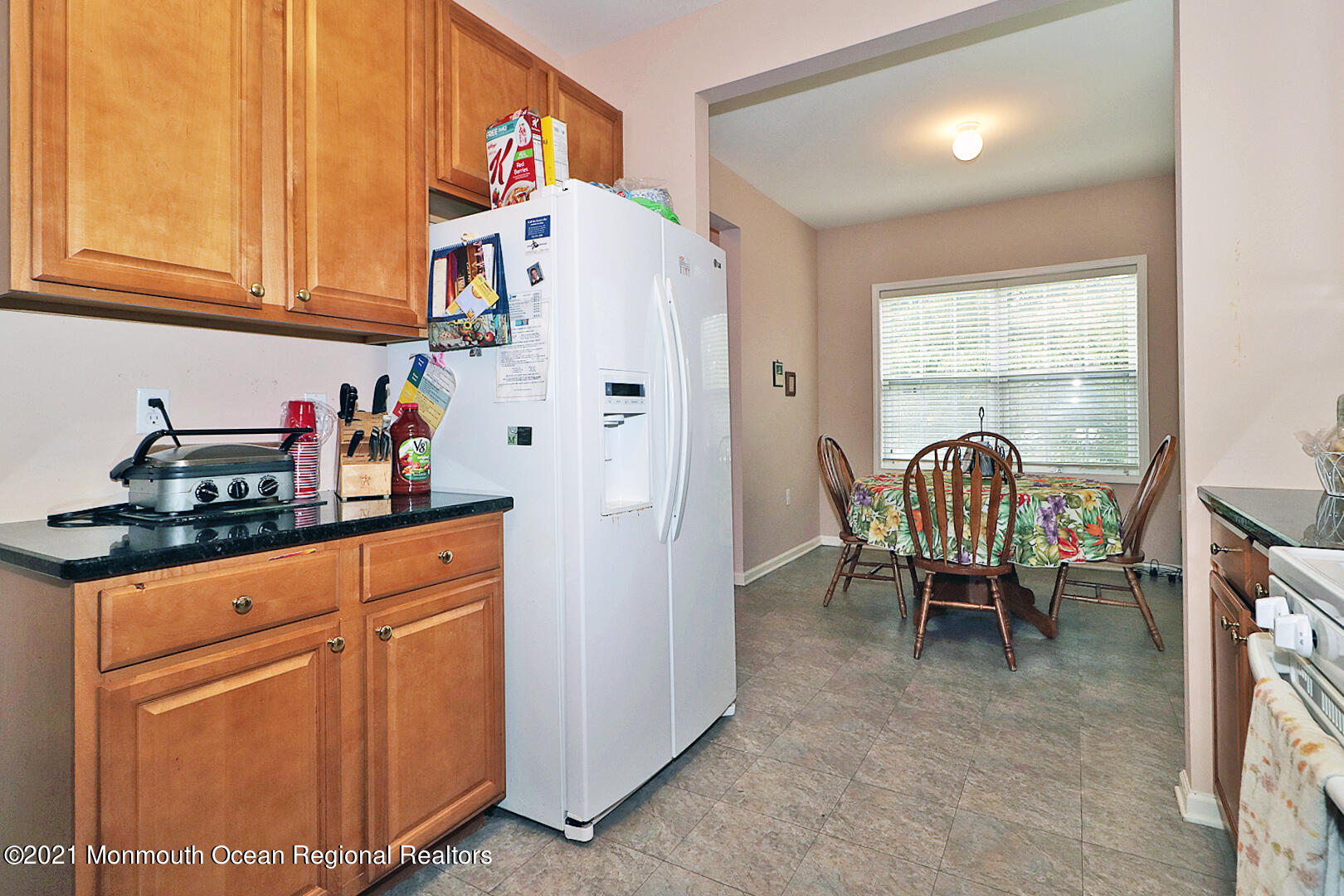 10 Silver Maple Lane Howell, NJ 07731 - Photo 9 of 37 a kitchen with stainless steel appliances granite countertop a refrigerator and a stove top oven